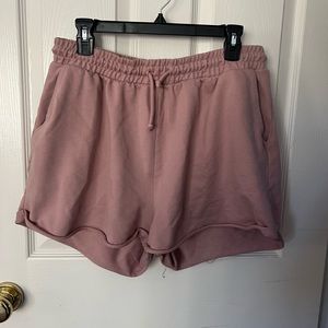 Rose gold sweats shorts with drawstring Used good condition.